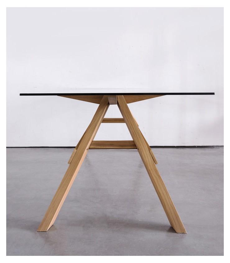 Ark Table constructed from solid wood and tempered glass top